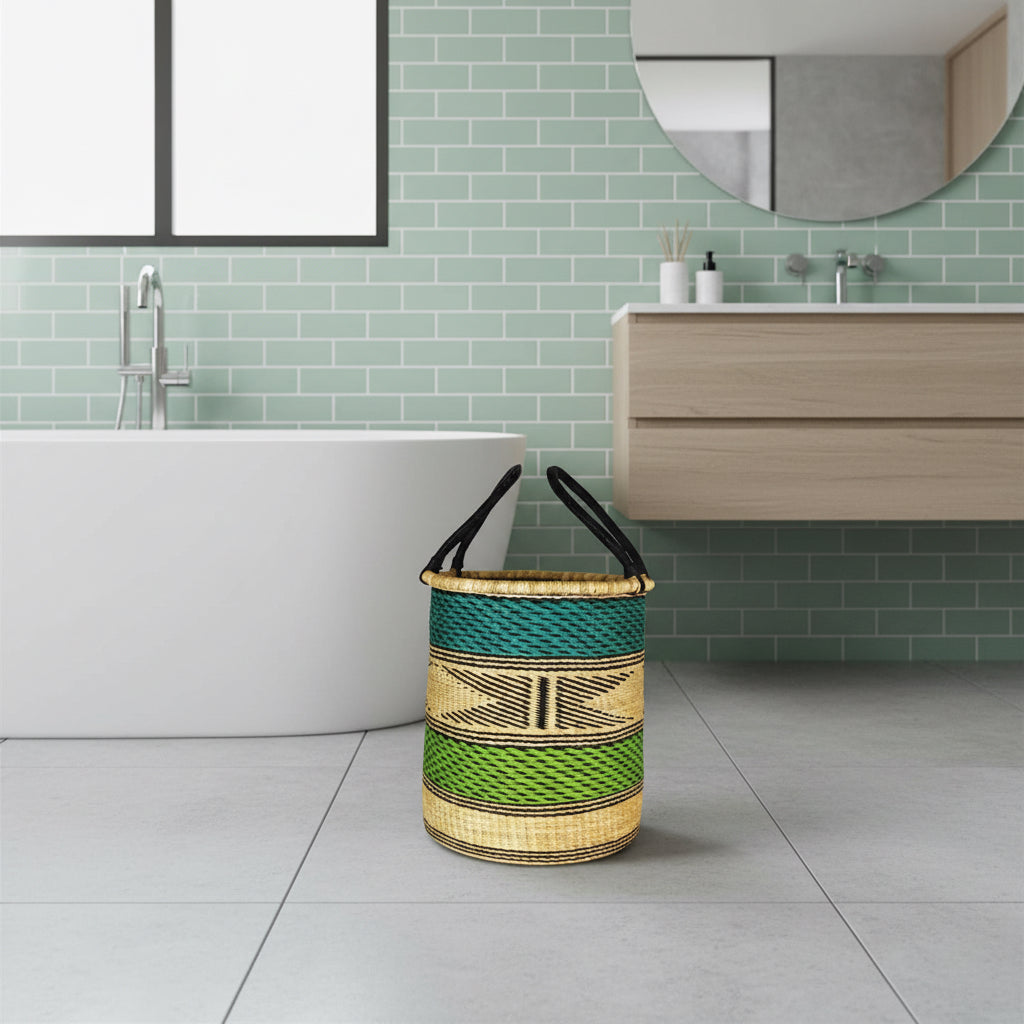 Woven basket with black handles on a white background