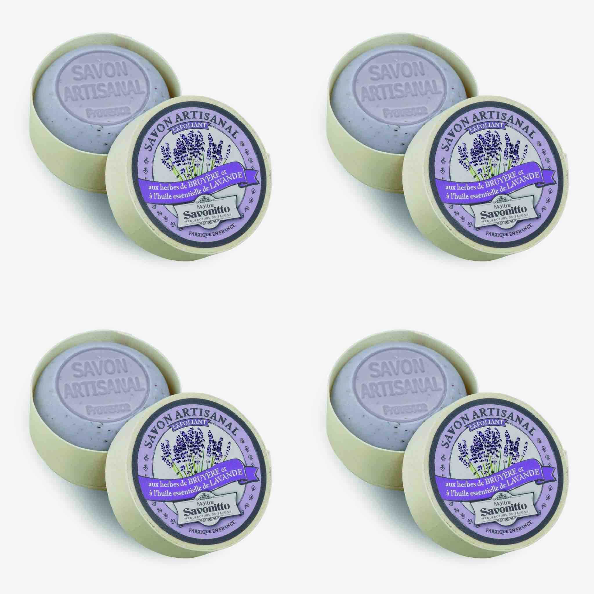 Multiple bars of Savon Artisanal soap with purple labels on a white background