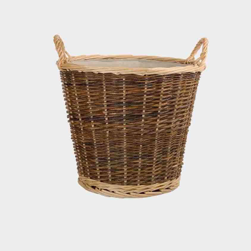 Wicker laundry basket on a white background
