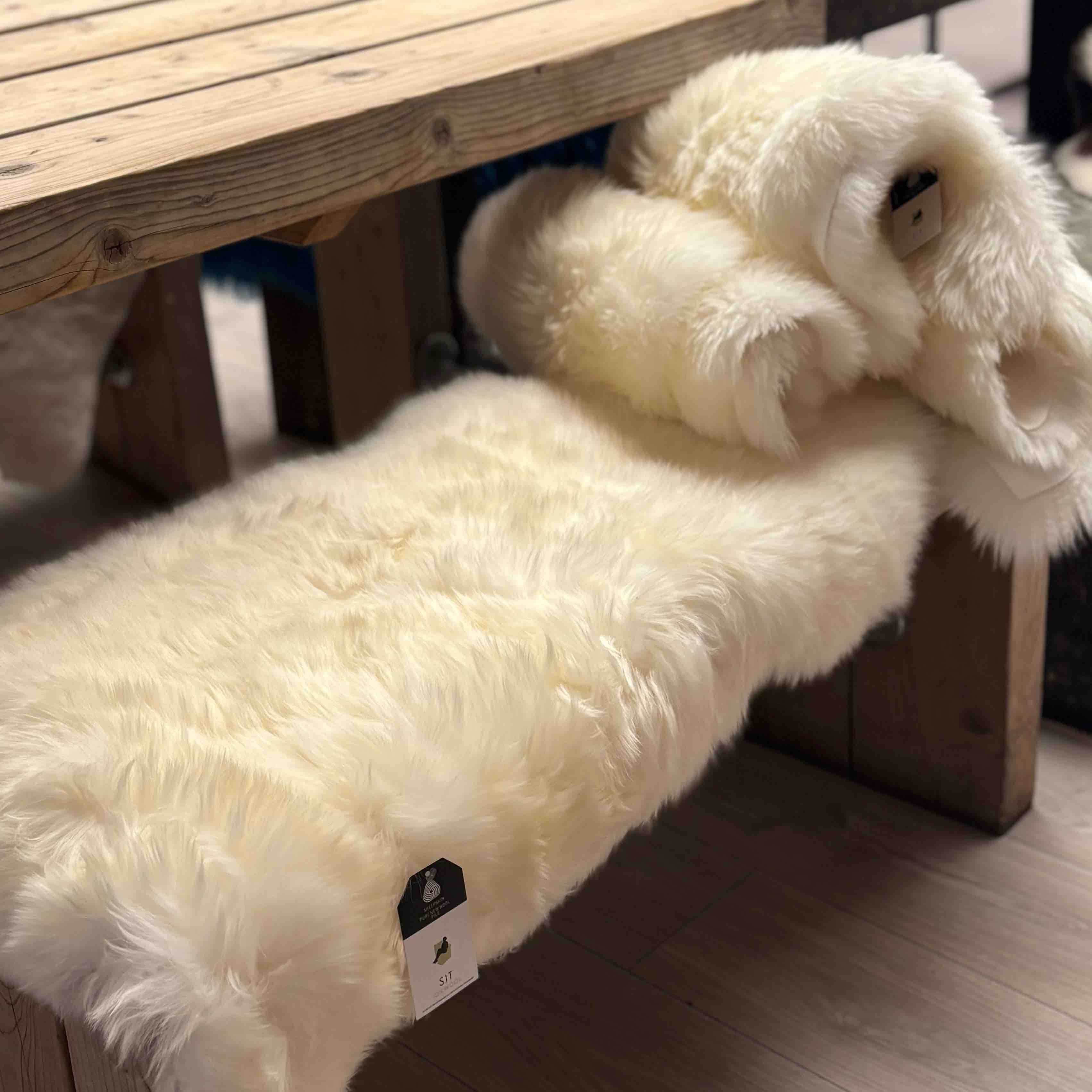4 Genuine Ivory Sheepskin Rugs plus Wicker  Basket 