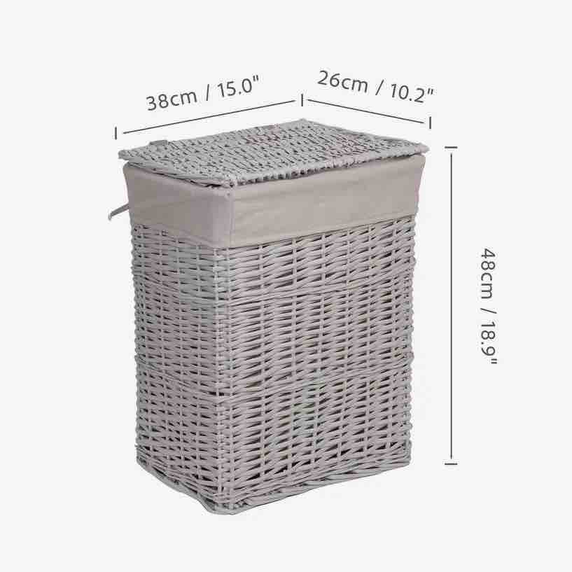 Wicker laundry basket with dimensions on a white background
