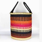 Woven basket with colorful striped pattern on a white background