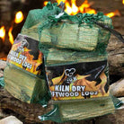 Rope Handle Wicker  Basket Filled With Logs